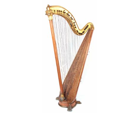 PLEYEL WOLFF LYON &amp; CO. PARIS. A GILT METAL FRAMED DOUBLE SIDED HARP with birdseye maple sound box and tuning buttons to 
