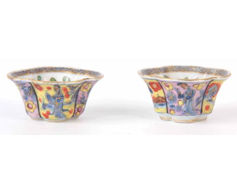 A PAIR OF 19TH CENTURY CHINESE PORCELAIN SALT DISHES of quatrefoil form decorated with panels depicting maidens, underglaze b