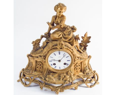 French gilt metal figure mounted mantel clock with striking movement 