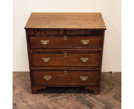 2'6 Georgian oak chest of 3 long drawers with brass fall handles standing on bracket type feet 