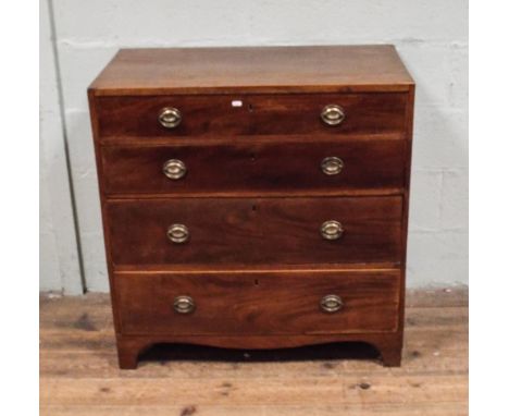 3' Georgian mahogany chest of four long drawers with brass fall handles standing on bracket feet, chest is fitted with elm si