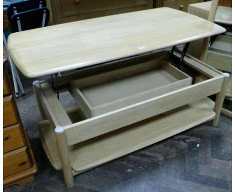 Ercol straw Windsor lifting top metamorphic supper table/coffee table with interior storage and under tier, 51" x 26"