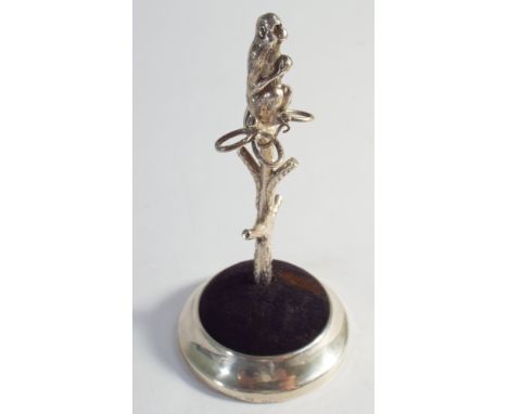 Edwardian hallmarked silver ring stand with monkey finial on a weighted tortoiseshell filled base - height 12cm 