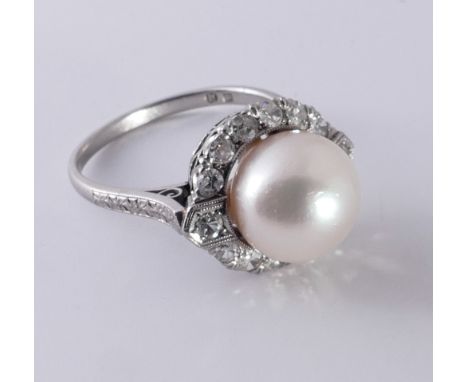 Platinum pearl and diamond ring, set with large cultured pearl in art deco style setting, ring size M/N