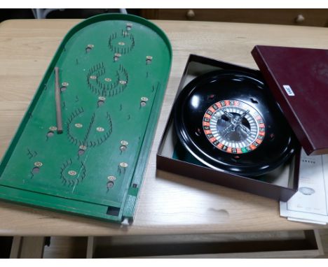 Pair of metal table lamps, roulette game and bagatelle board 