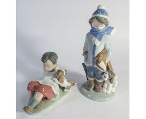 2 pieces of Lladro - boy wrapped up for winter with a scarf and another of a choir boy playing with a puppy