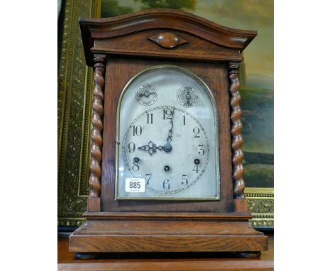 Edwardian 3 train chiming bracket clock with arched silver dial in oak case with barley twist columns 