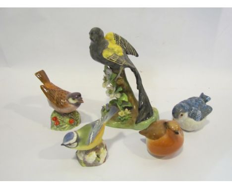 A J. T. Jones model of a bird for Crown Staffordshire bone china, together with a Royal Worcester Sparrow, Blue Tit and two u