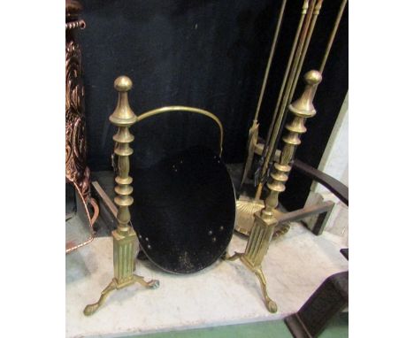 A pair of solid brass fire dogs, ring turned decoration, bird claw feet, 55cm tall   