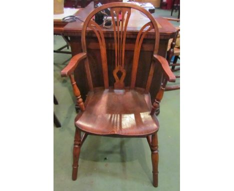 A circa 1860 style Thames valley Windsor elbow chair with pierced splat back rest the elm seat on ring turned legs joined by 