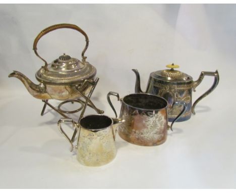 A three piece silver plated teaset to include teapot, sugar bowl and cream jug together with a silver plated spirit kettle on