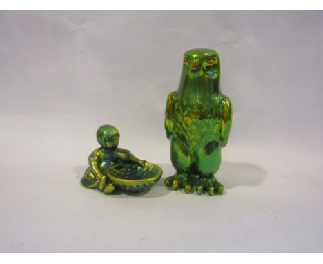 A Zsolnay Pecs lustre glazed pottery eagle together with a figure of a seated girl with bowl (2)   
