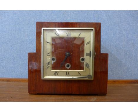 An Art Deco oak mantel clock 