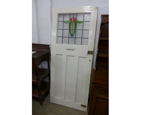 An Arts and Crafts stained glass door 