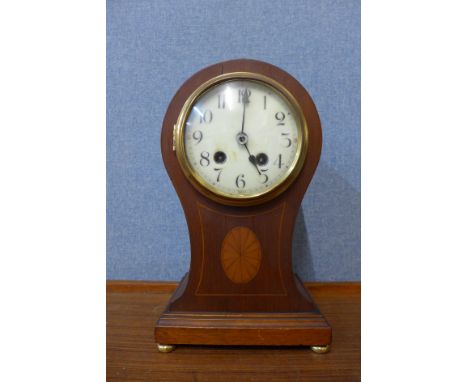 An early 20th Century inlaid mahogany balloon shaped mantel clock 