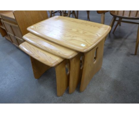 An Ercol Blonde ash nest of tables 