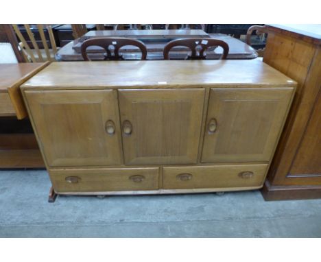 An Ercol Blonde elm Windsor sideboard 