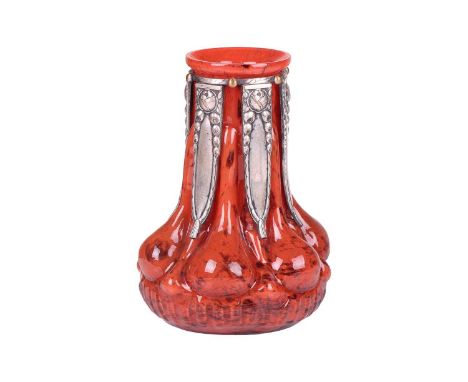 Paul Daum and Pierre D’Avesn for ‘Verreries D’Art Lorrain’, an unusual blown red glass vase of lobed form, circa 1930, with s