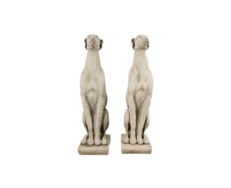 A pair of reconstituted stone gate capitals - modelled as greyhounds, 56cm high.