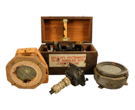 An Air Ministry MKII astro compass - boxed, together with two P type compasses and a 3' panel mounted course selector. (4)