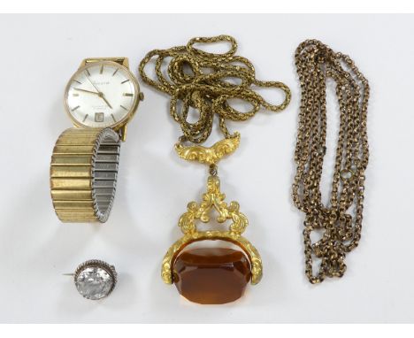 A gilt metal fob seal - with a triangular rotating matrix, together with an Accurist watch, a length of chain and a small bro