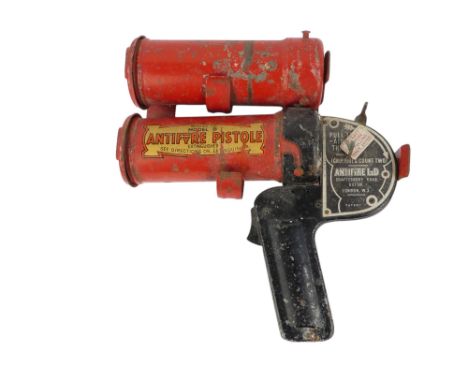 A vintage Antifyre Pistole fire extinguisher - with mounting bracket and spare canister, 22cm.