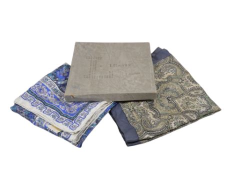 A Liberty silk scarf - blue and green floral on a grey ground, 70 x 70cm, with a Liberty box and another Liberty grey paisley