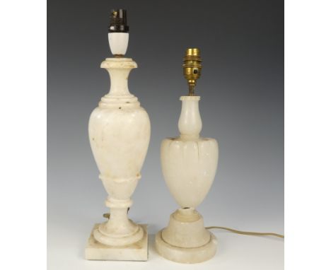 A mid 20th century alabaster table lamp - of vase form raised on a square base, 38cm high, together with another similar lamp