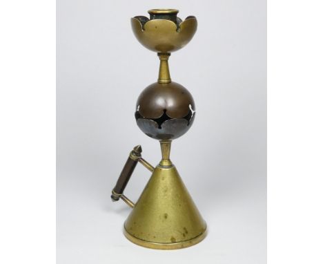 An Arts &amp; Crafts brass and copper candlestick - probably Dr Christopher Dresser by Benham &amp; Froud, with a brass flora