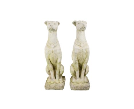 A pair of large reconstituted stone gate capitals - modelled as greyhounds, 76cm high. (2)