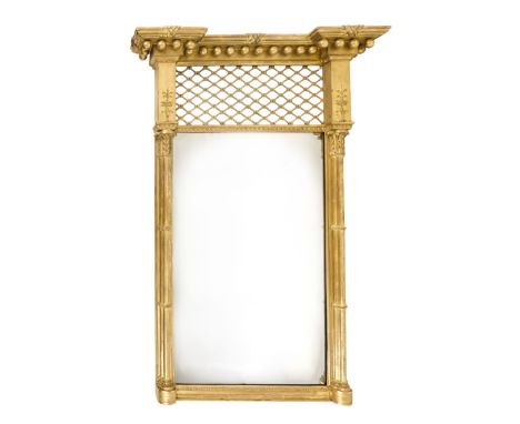 A George IV giltwood pier mirror - with a ball mounted moulded cornice above a grille panel and rectangular plate flanked by 