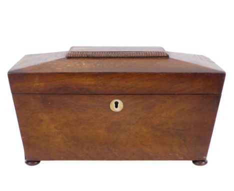 A William IV rosewood tea caddy - of sarcophagus form, the interior with two compartments, raised on bun feet, 30cm wide.