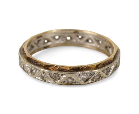 A white metal and diamond set eternity band - size M, 2.5g.