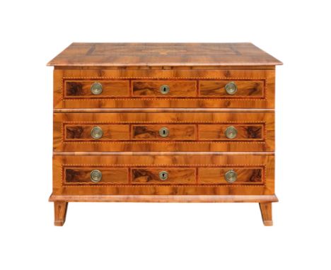 An early 19th century walnut chest of drawers - possibly Maltese, the rectangular top incorporating an inlaid panel with a va