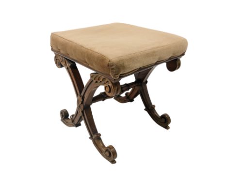 A William IV rosewood X-framed stool - the over-stuffed rectangular seat above X-shaped supports with foliate cappings and a 