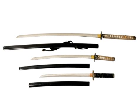 A late 20th century Japanese katana - with a bound fish-skin handle and black lacquer scabbard, blade 72cm, together with a w