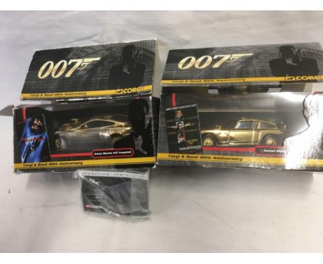 2 BOXED ASTON MARTIN V12 VANQUISH COMMEMORATING THE CORGI &amp; BOND 40TH ANNIVERSARY IN BOXES