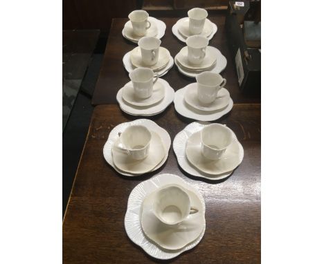 SHELF OF SHELLY CUPS, SAUCERS &amp; PLATES