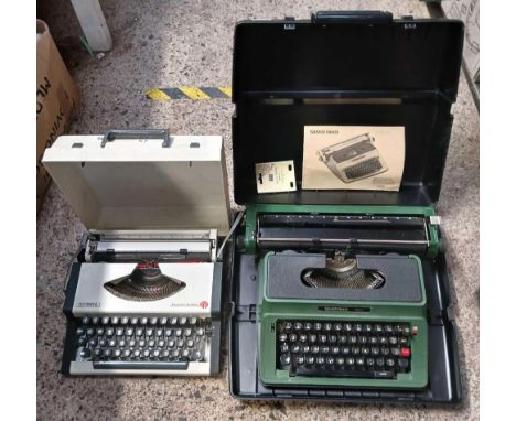 SILVER REED 500 PORTABLE TYPEWRITER &amp; AN OLYMPIA TRAVELLER DELUX TYPEWRITER, BOTH IN CASES
