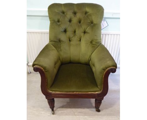 A William IV mahogany framed lyre front library chair with enclosed, scrolled arms and reed carved facings, part button uphol