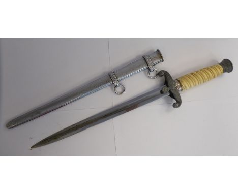 A German Army dagger with a wrythen moulded handgrip, a foliate cast pommel and hilt, bearing a spreadeagle and swastika embl