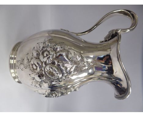A mid 19thC Tiffany American silver cordial pitcher of segmented ovoid form, having a waisted neck, a flared, rolled rim and 