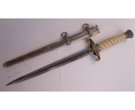 A German Army dagger with a wrythen moulded handgrip, foliate cast pommel and hilt, bearing a spreadeagle and swastika emblem