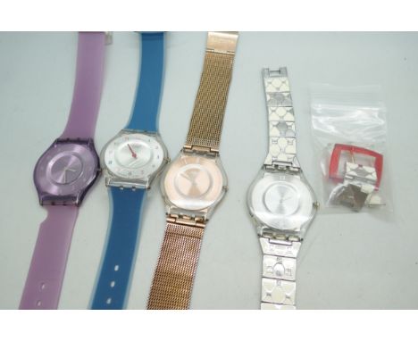 Four Ultra Slim Skin Swatch watches 