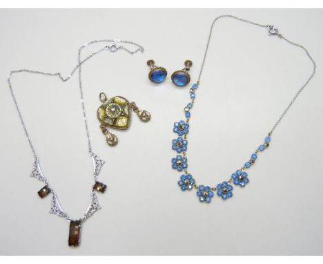 A collection of vintage jewellery including a pair of silver butterfly wing earrings, a micro mosaic pendant, and two necklac