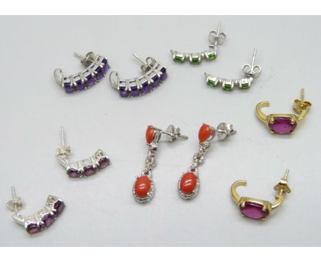 Five silver hoop and drop earrings set with precious stones including 2.32ct Zambian amethyst, Medit coral 1.780cts, garnet 3
