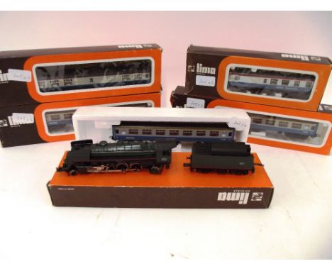 A Lima HO scale 2-8-2 continental engine and tender, SNCF green (4)R 1094 and 5 British outline Mk1 coaches, (one in box base