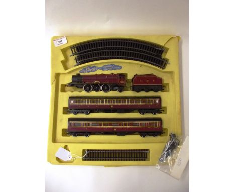 A Triang/Hornby 4-6-2 engine and tender, "Princess Elizabeth", front bogie and running gear detached; 2 LMS coaches and track