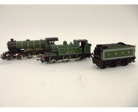 A Hornby 4-6-0 engine and tender, B12 LNER green 8579 and 0-6-0 tank engine J83 LNER green