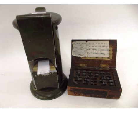 A Railway ticket machine, by Waterlow & Sons, London, 26cm high; and a box of various punched letters and numbers - see illus